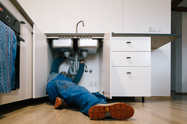 Professional Emergency Plumber technician working in Warm Springs, GA